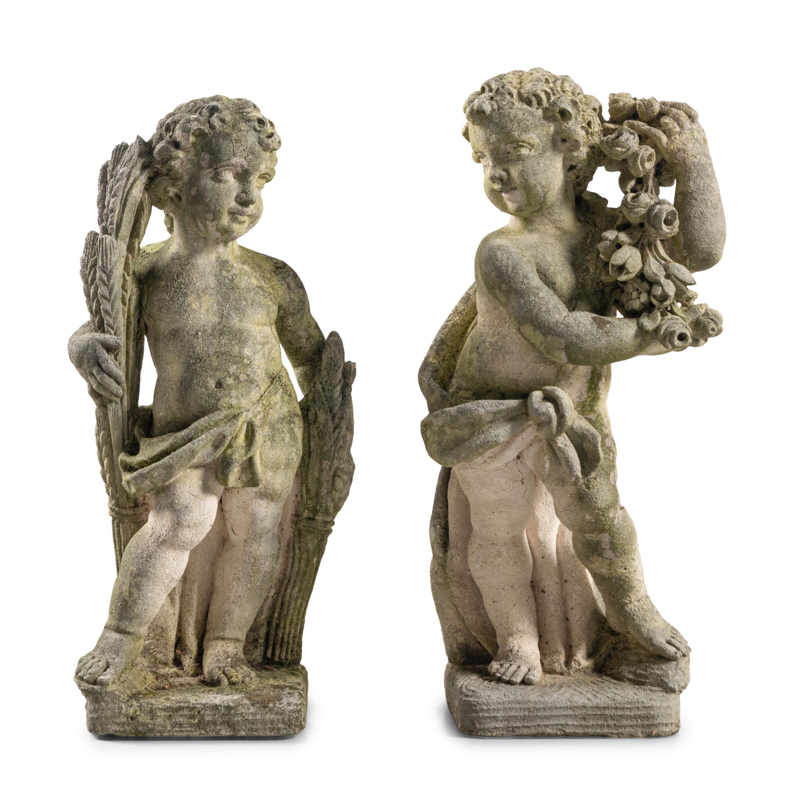 A Pair of Carved Limestone Garden Figures