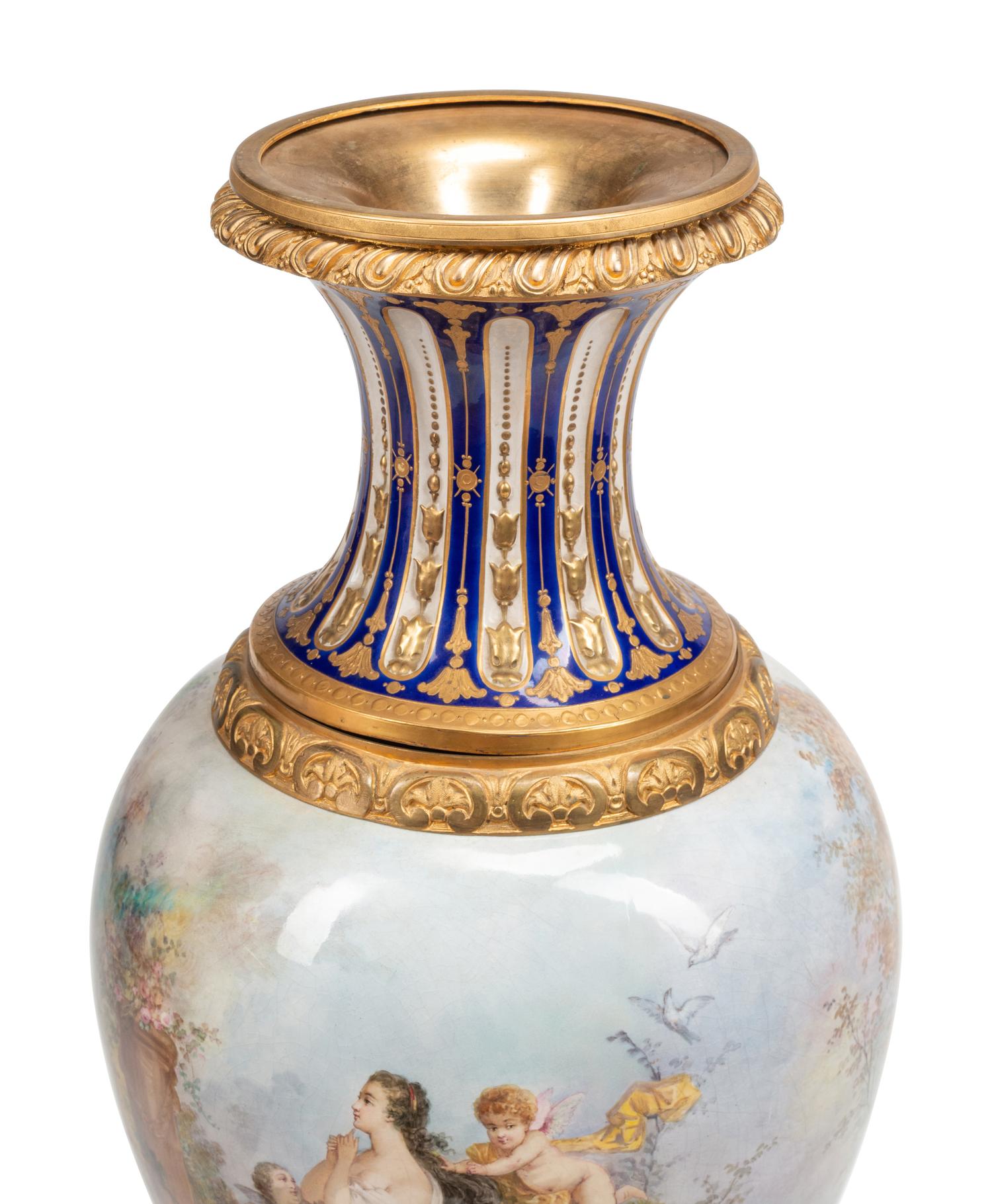 A Pair of Large Gilt Bronze Mounted Sèvres Porcelain Vases