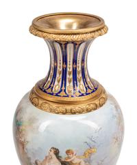 A Pair of Large Gilt Bronze Mounted Sèvres Porcelain Vases