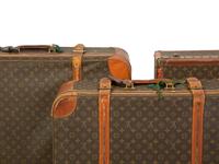 Three Louis Vuitton Travel Cases — 20TH CENTURY