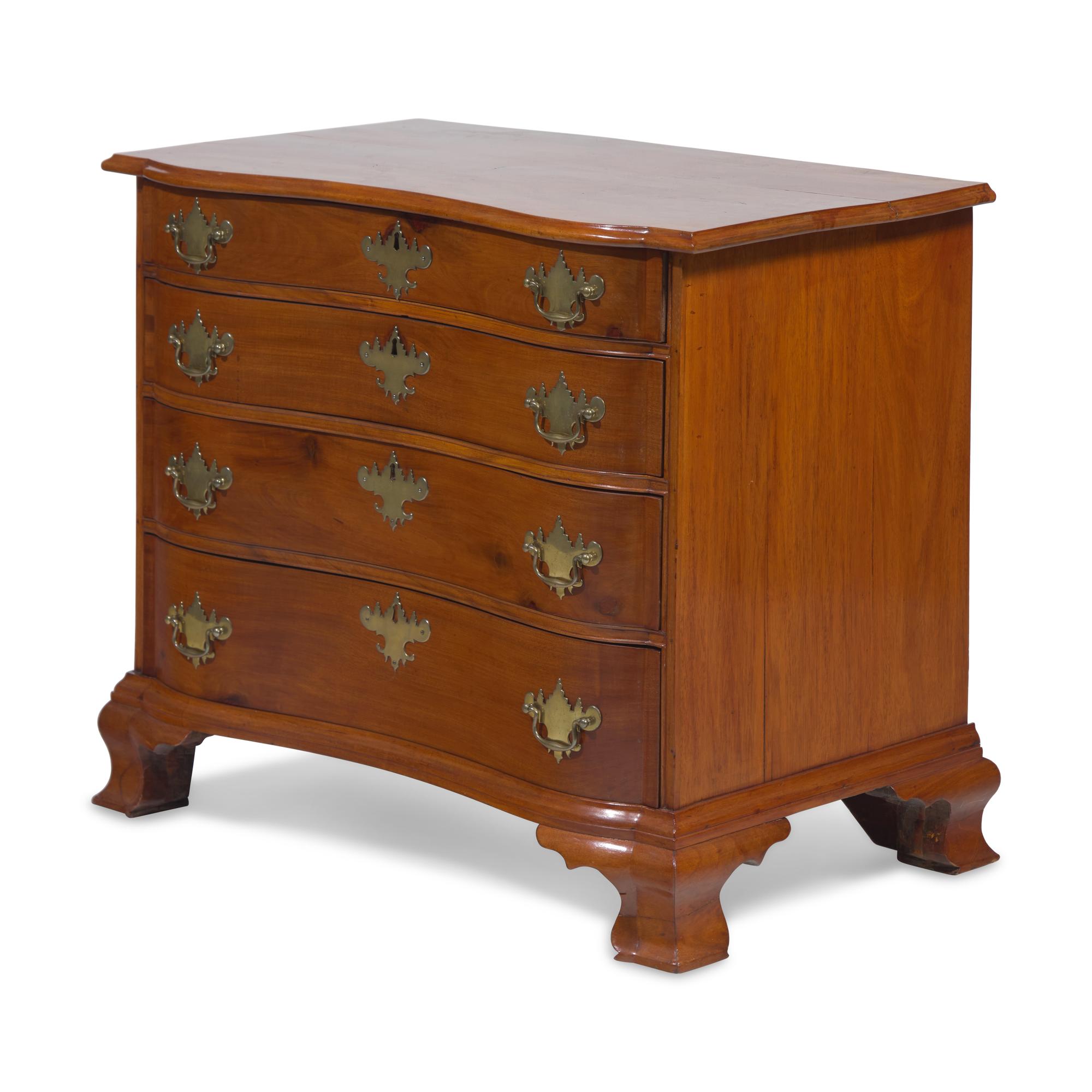A Chippendale Cherry Oxbow Chest of Drawers