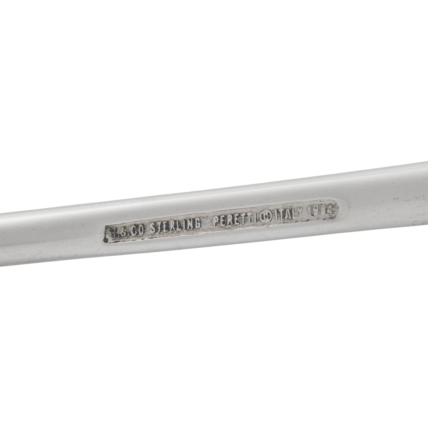A Tiffany and Co. Silver Candle Snuffer