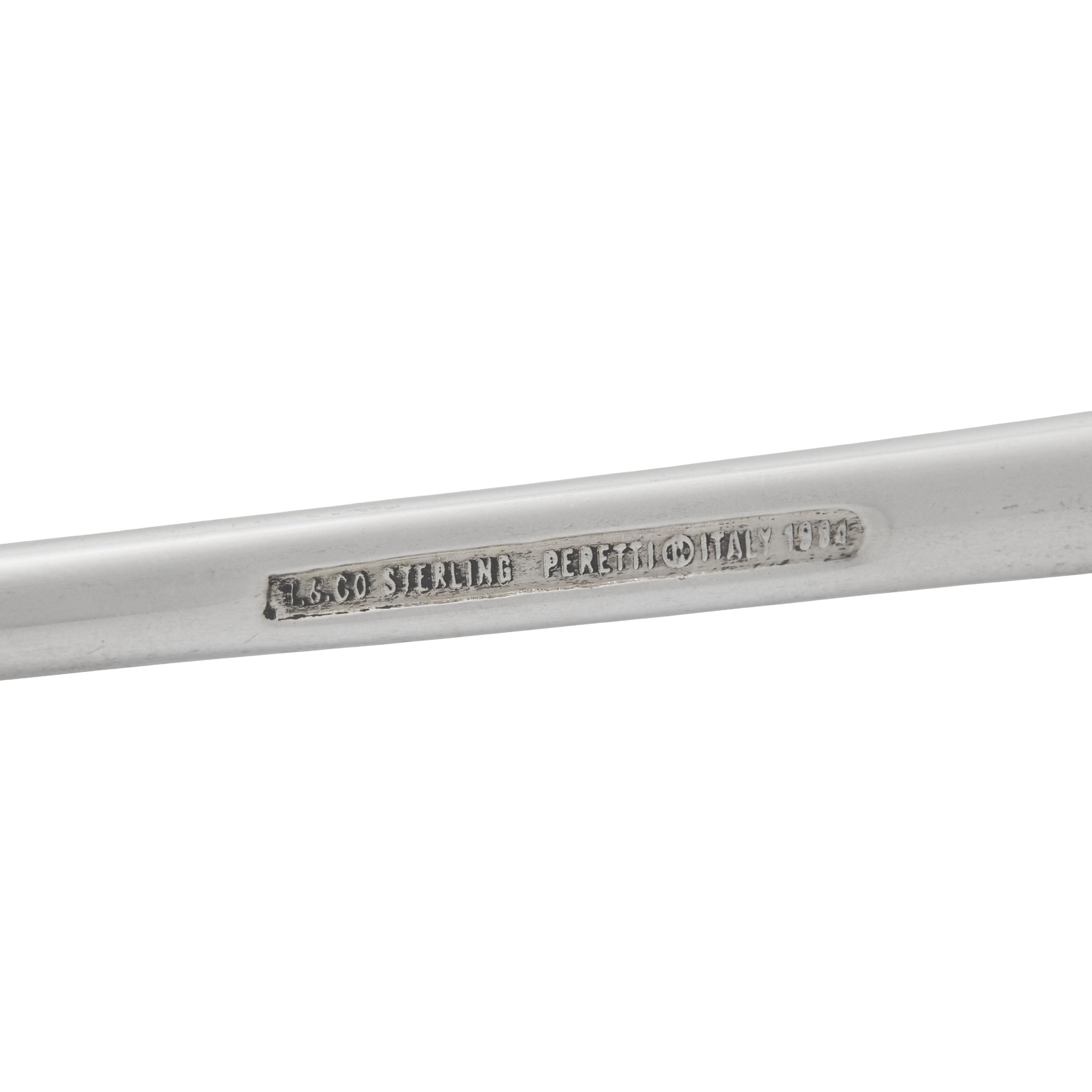 A Tiffany and Co. Silver Candle Snuffer