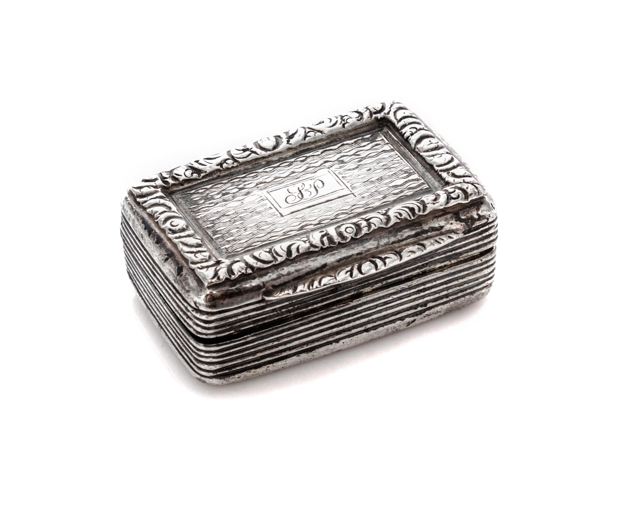A George III Silver Vinaigrette, Thomas Evans, London, 1792, having a foliate decorated border opening to an interior screen decorated