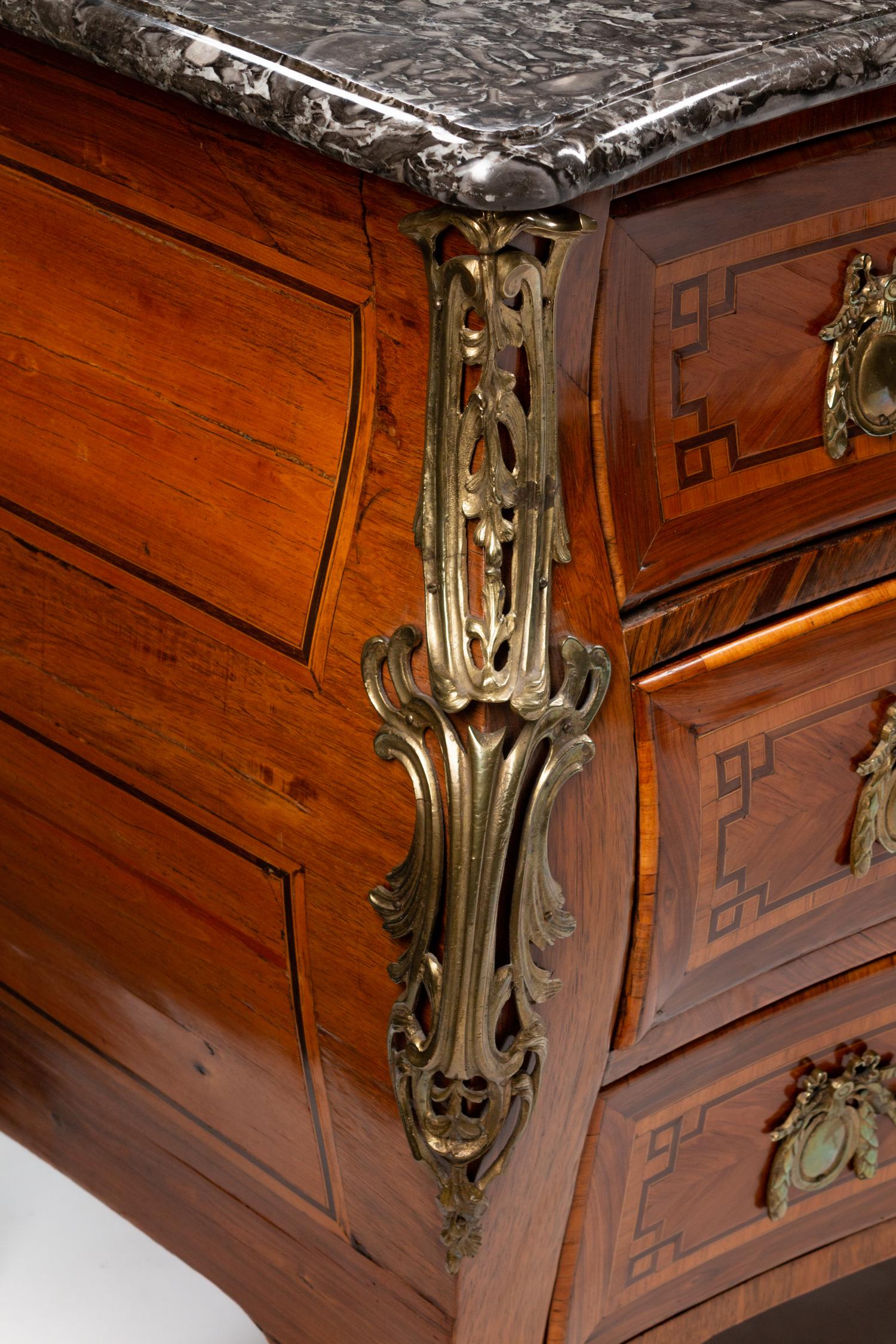 A Régence Gilt-Bronze-Mounted Inlaid Kingwood and Bois de Rose Commode