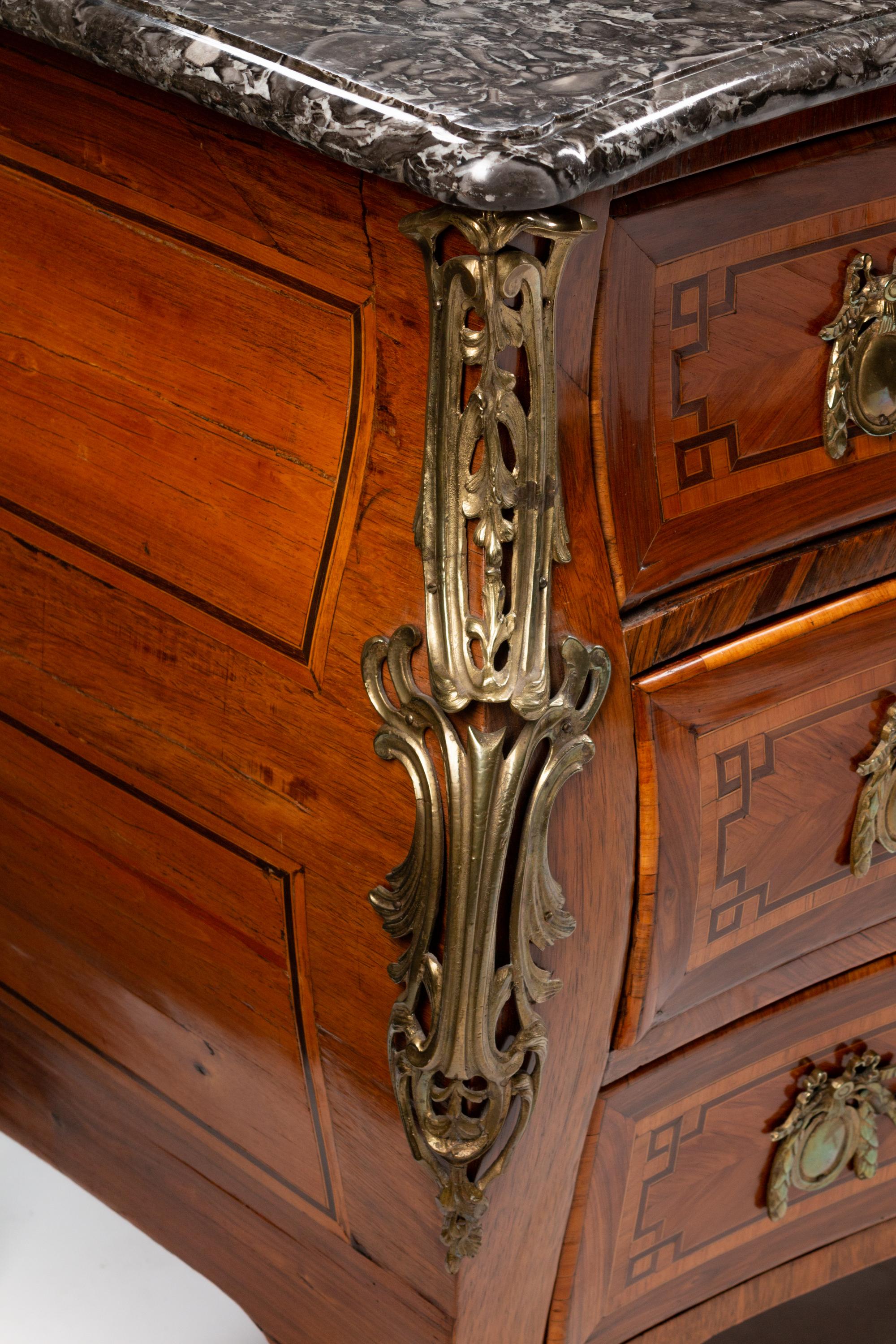 A Régence Gilt-Bronze-Mounted Inlaid Kingwood and Bois de Rose Commode