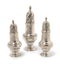 A Group of Three Georgian Silver Casters, London, Height of tallest 6 inches.