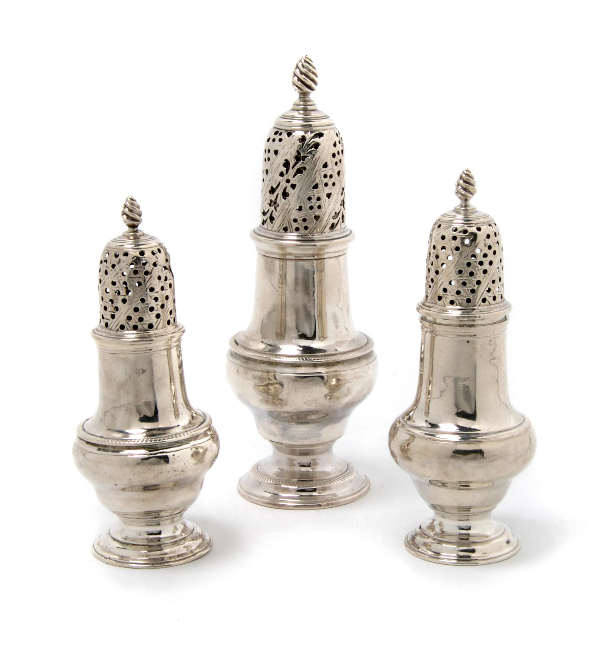 A Group of Three Georgian Silver Casters, London, Height of tallest 6 inches.