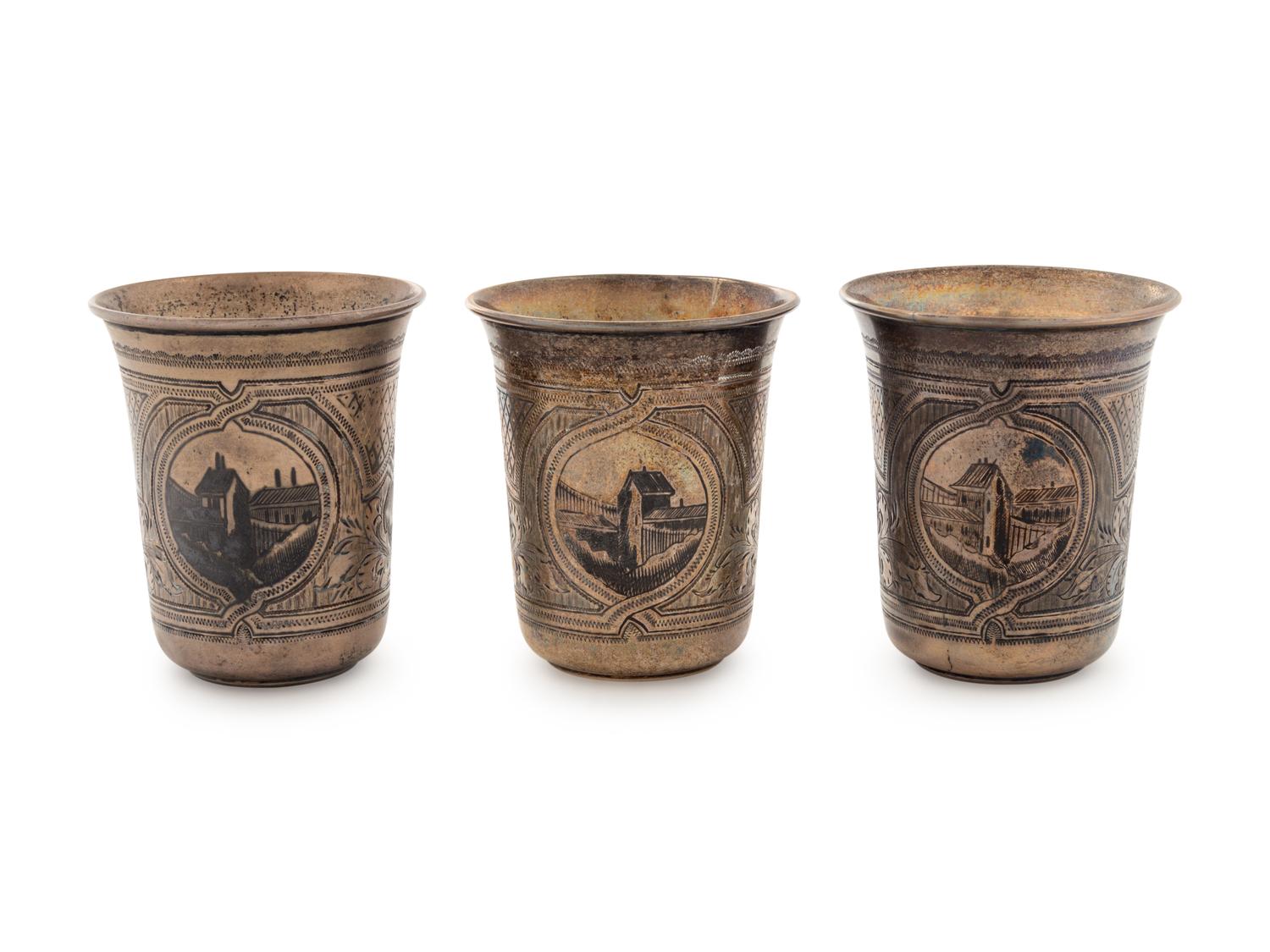A Set of Three Russian Niello Silver Tumblers