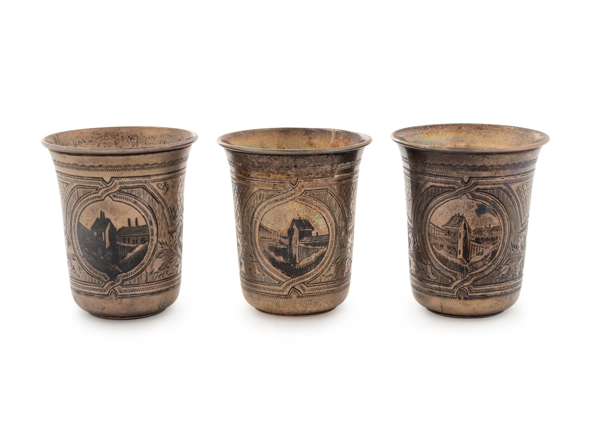 A Set of Three Russian Niello Silver Tumblers