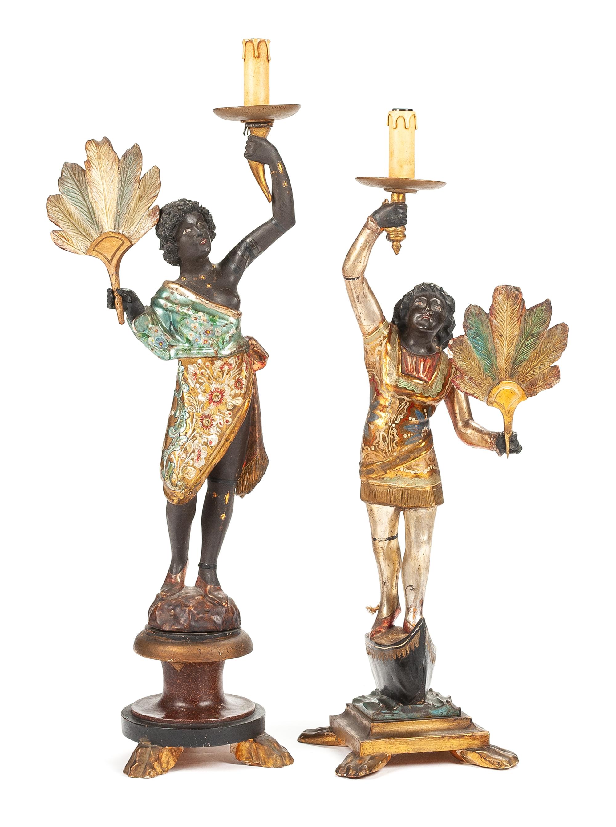 Two Venetian Polychromed Figural Candlesticks Height of taller 32 inches. — LATE 19TH CENTURY