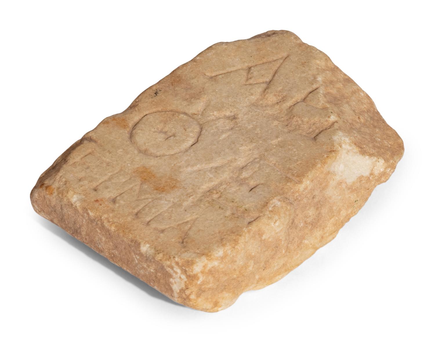 A Roman Marble Relief Fragment