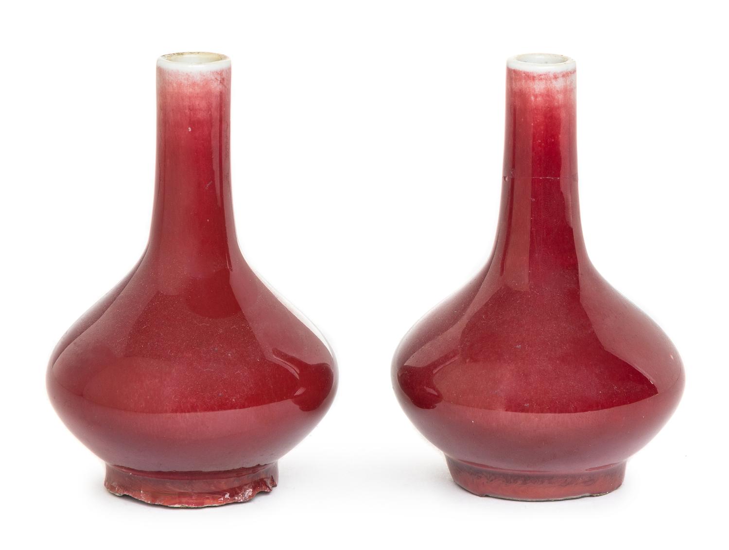 A Small Pair of Sang-de-Boeuf Glazed Porcelain Vases Height 4 1/2 inches.