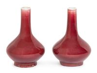 A Small Pair of Sang-de-Boeuf Glazed Porcelain Vases Height 4 1/2 inches.