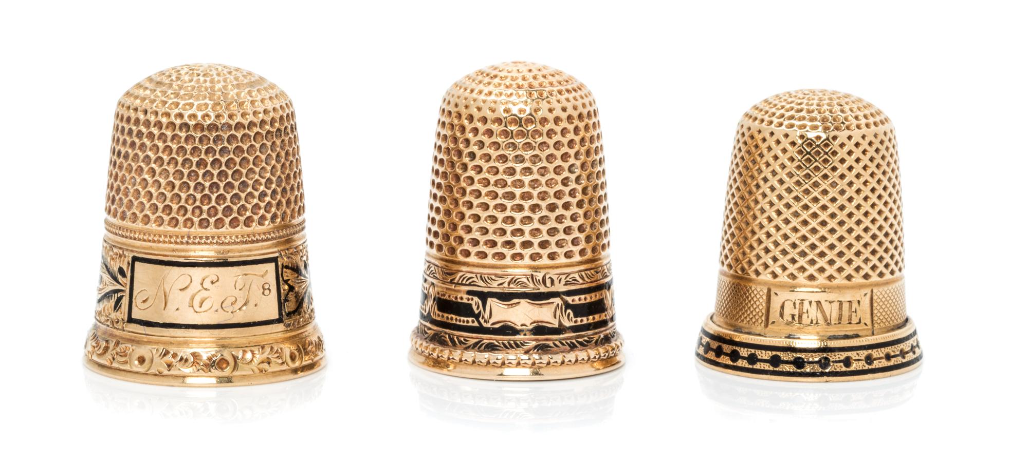 Three American Yellow Gold and Enamel Thimbles, Various Makers, each having a knurled top and body above a black enamel band, comprisin