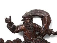 A Continental Carved Figural Ornament