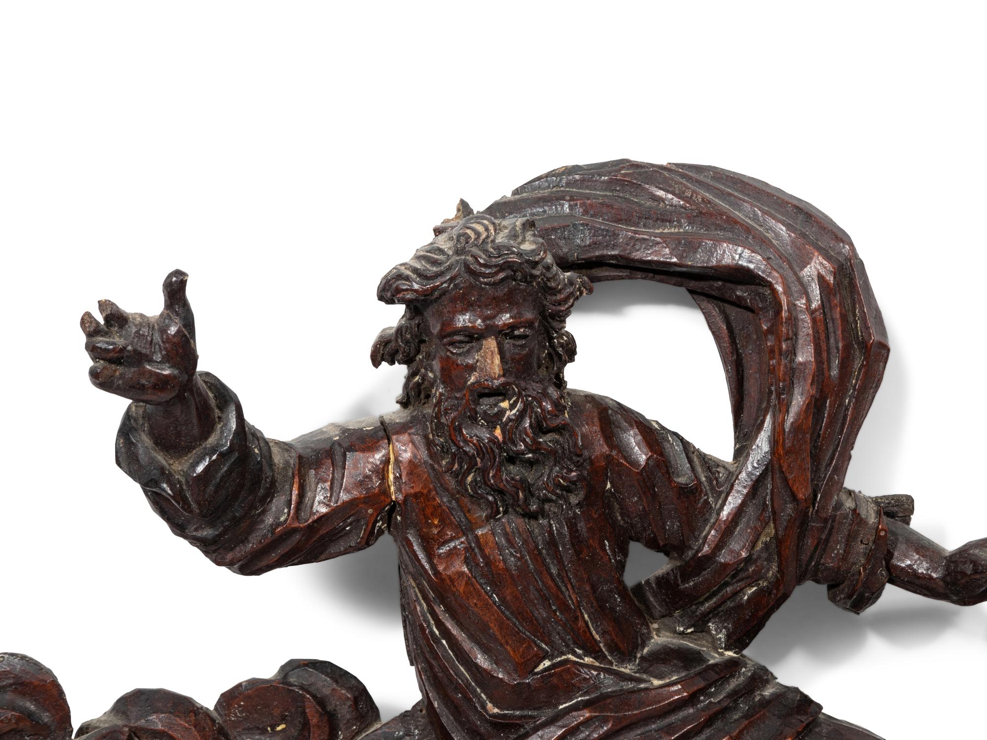 A Continental Carved Figural Ornament