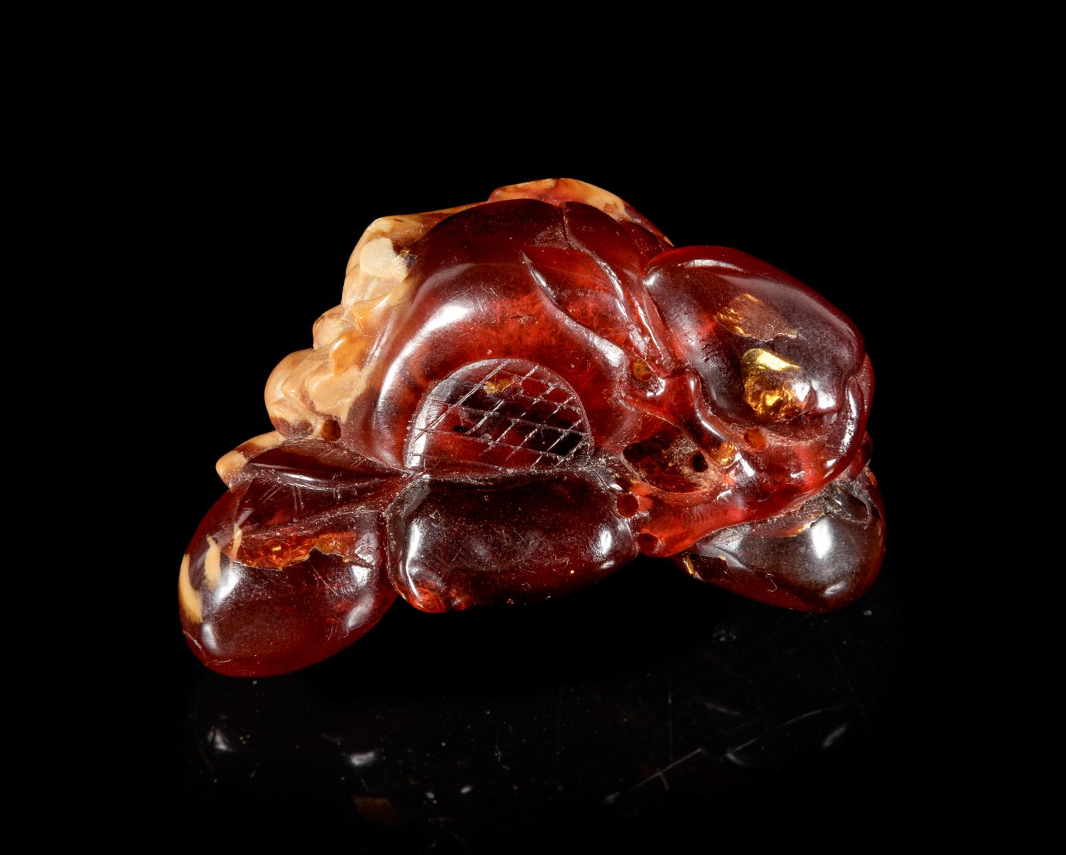 A Carved Amber Hand Citron-Form Snuff Bottle