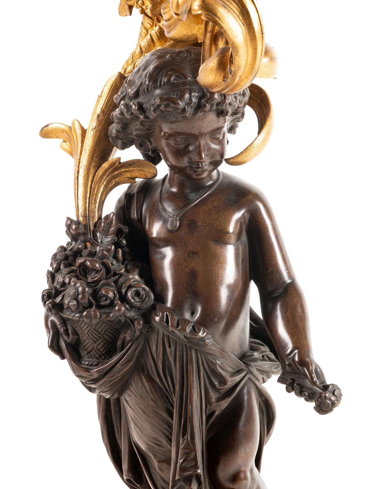 A Louis XV Style Gilt and Patinated Bronze Five-Light Candelabrum