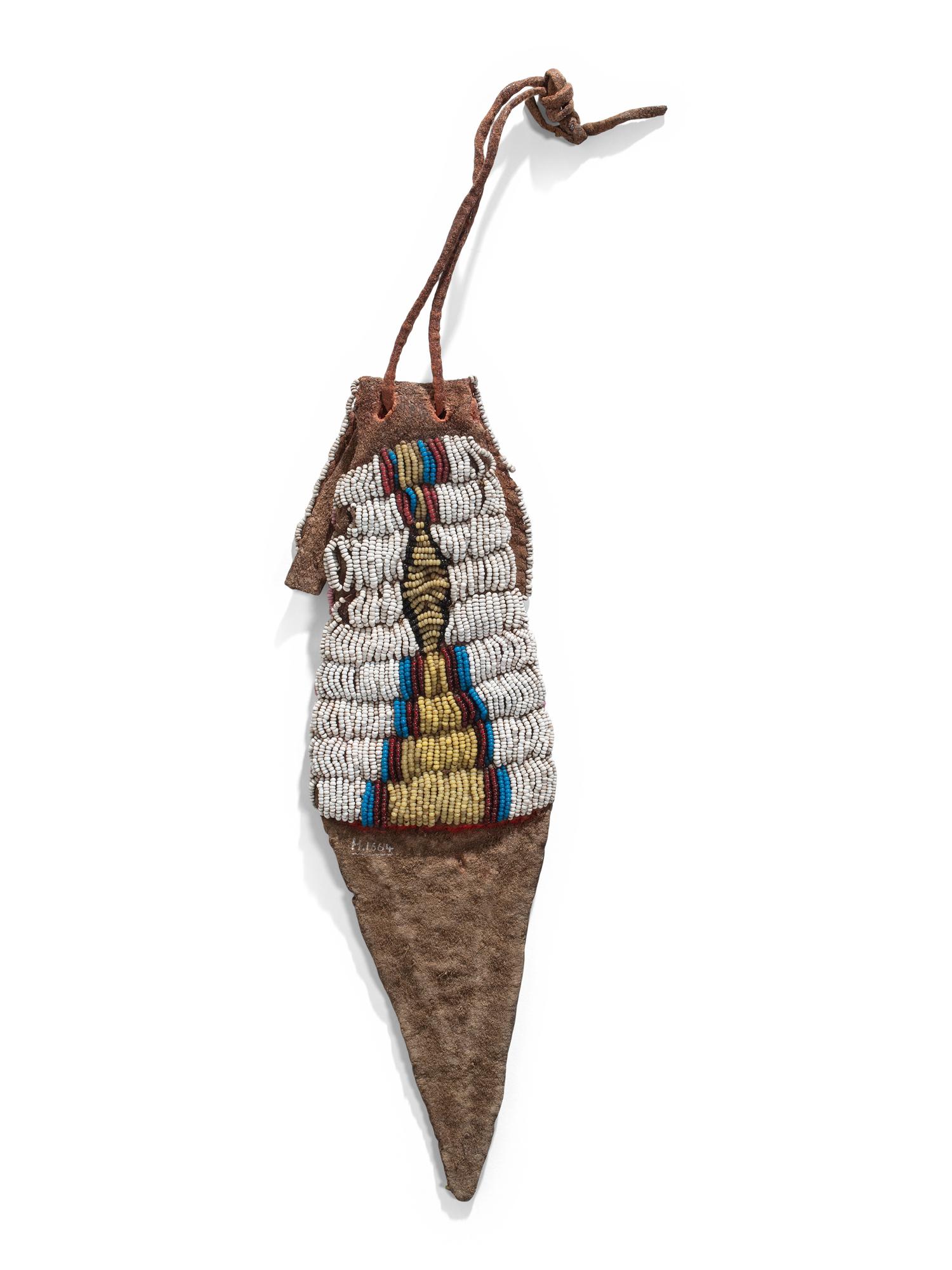 Plains Beaded Buffalo Hide Paint Pouch, Published