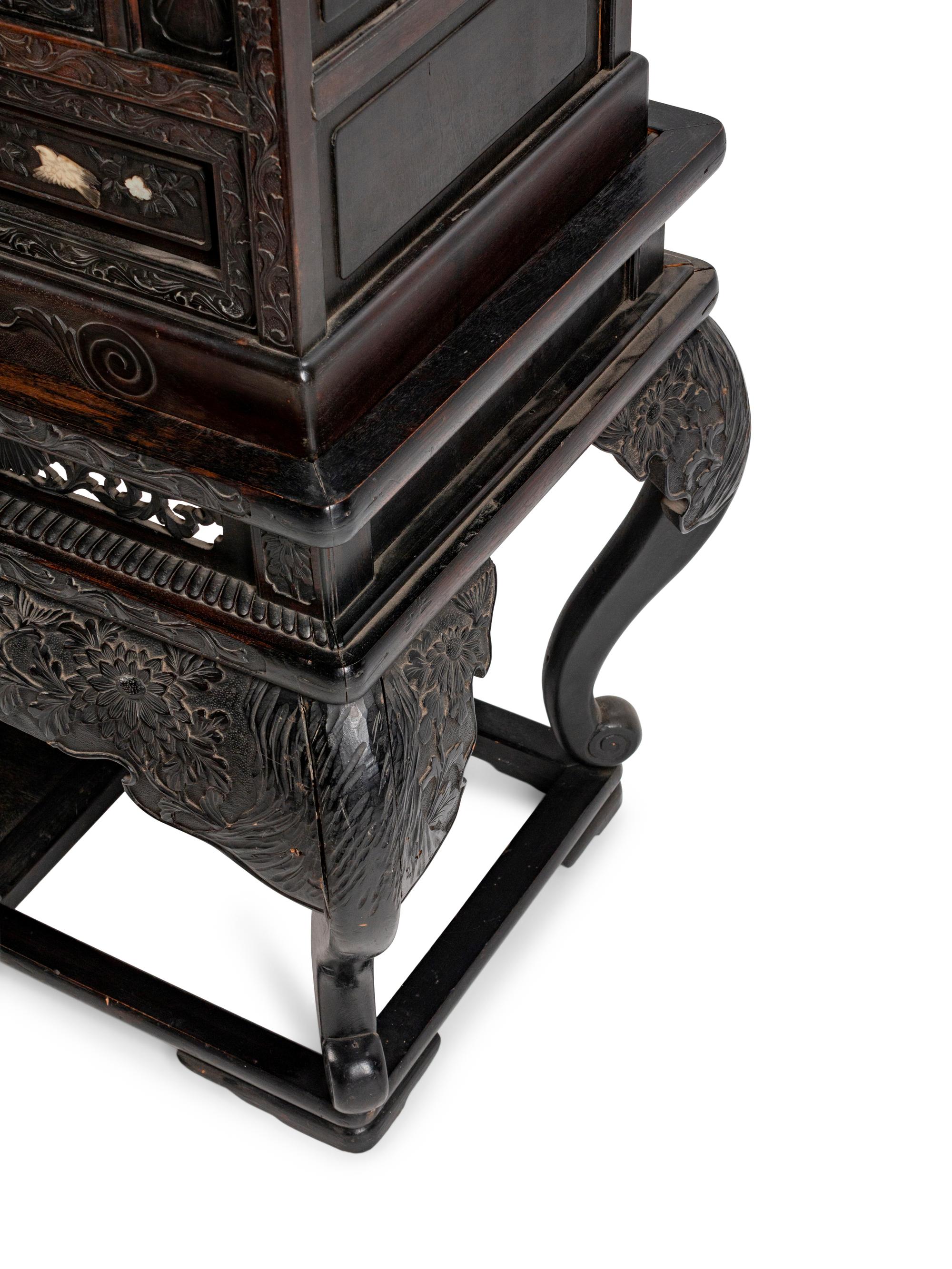 A Japanese Bone-Mounted Pierce-Carved Hardwood Cabinet on Stand — 19TH CENTURY