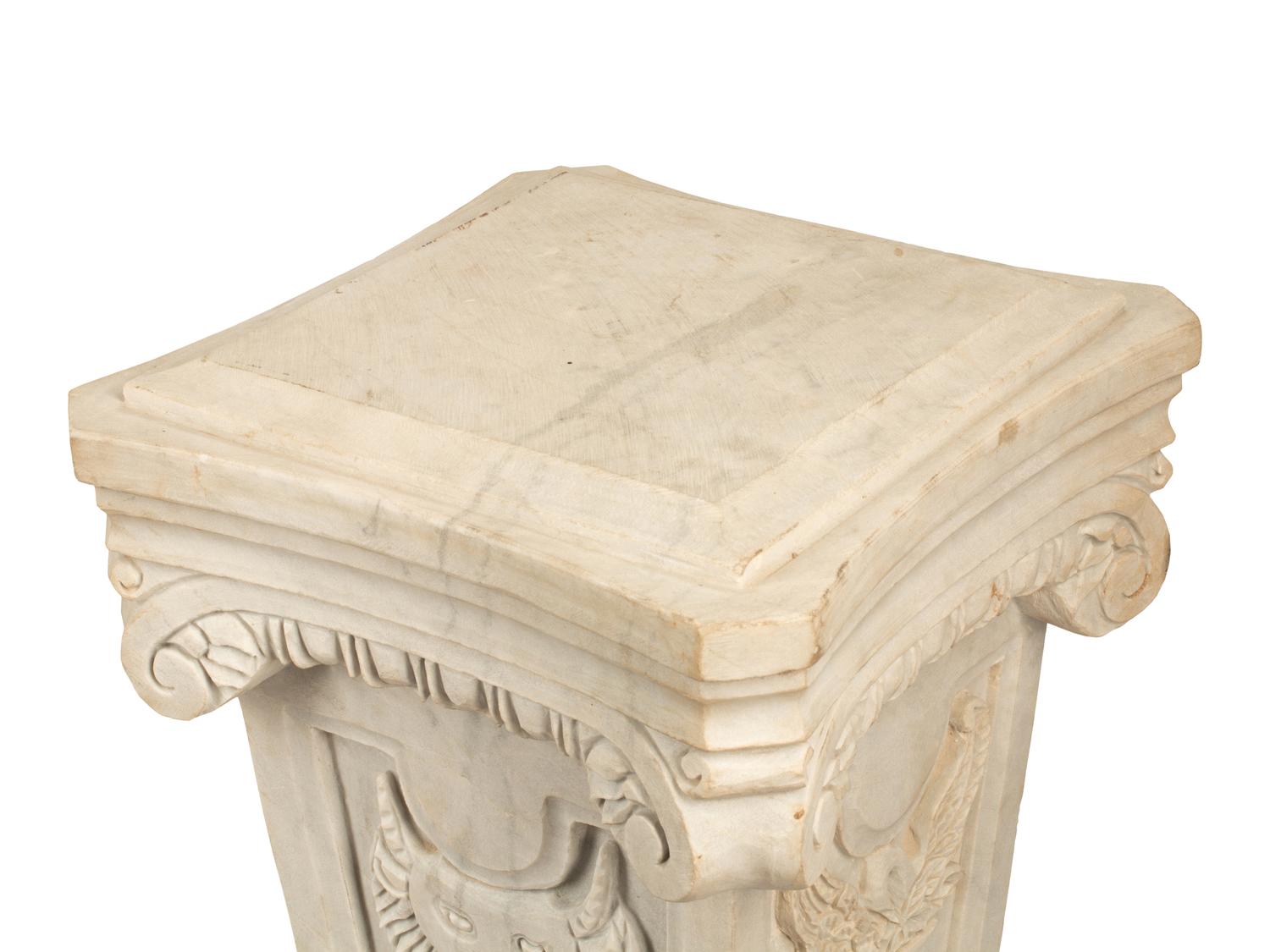 A Pair of Italian Carved Marble Pedestals