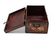 A Chinese Lacquered Leather Chest