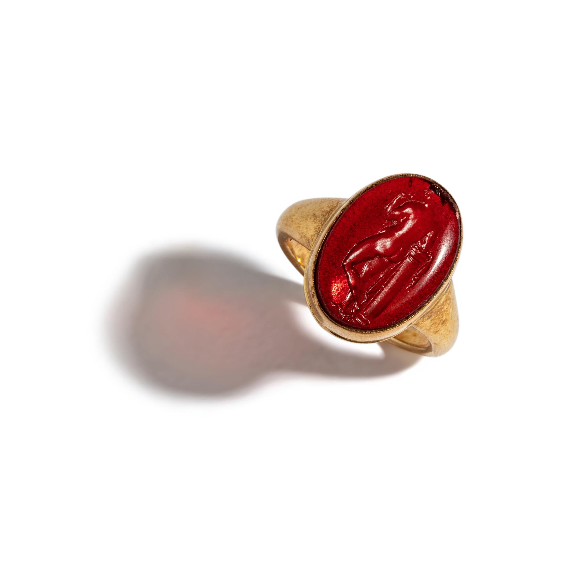 A Neoclassical Gold and Glass-Cast Finger Ring with the Goddess Venus