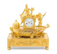 An Empire Gilt Bronze Mantel Clock — EARLY 19TH CENTURY