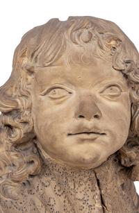 A Continental Terra Cotta Bust of a Boy