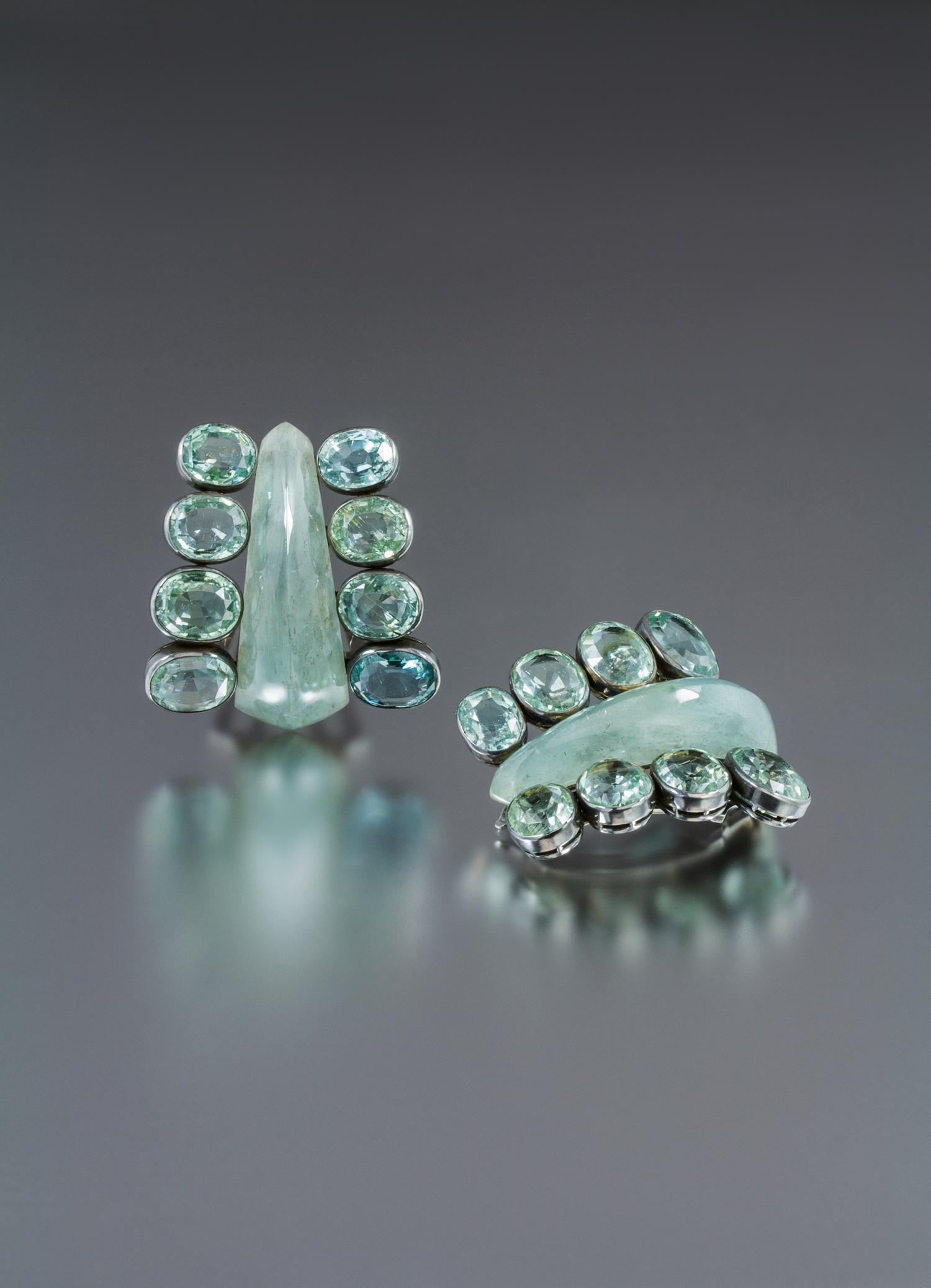 A Pair of Silver, Green Beryl and Carved Aquamarine Dress Clips, Suzanne Belperron, 67.30 dwts.