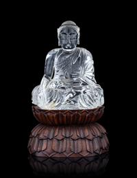 A Carved Rock Crystal Figure of Buddha