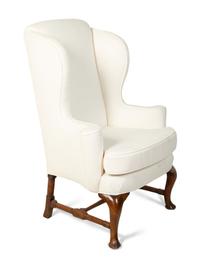 A Queen Anne Style Wingback Armchair — 18TH CENTURY