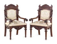 A Pair of French Renaissance Revival Carved Walnut Armchairs