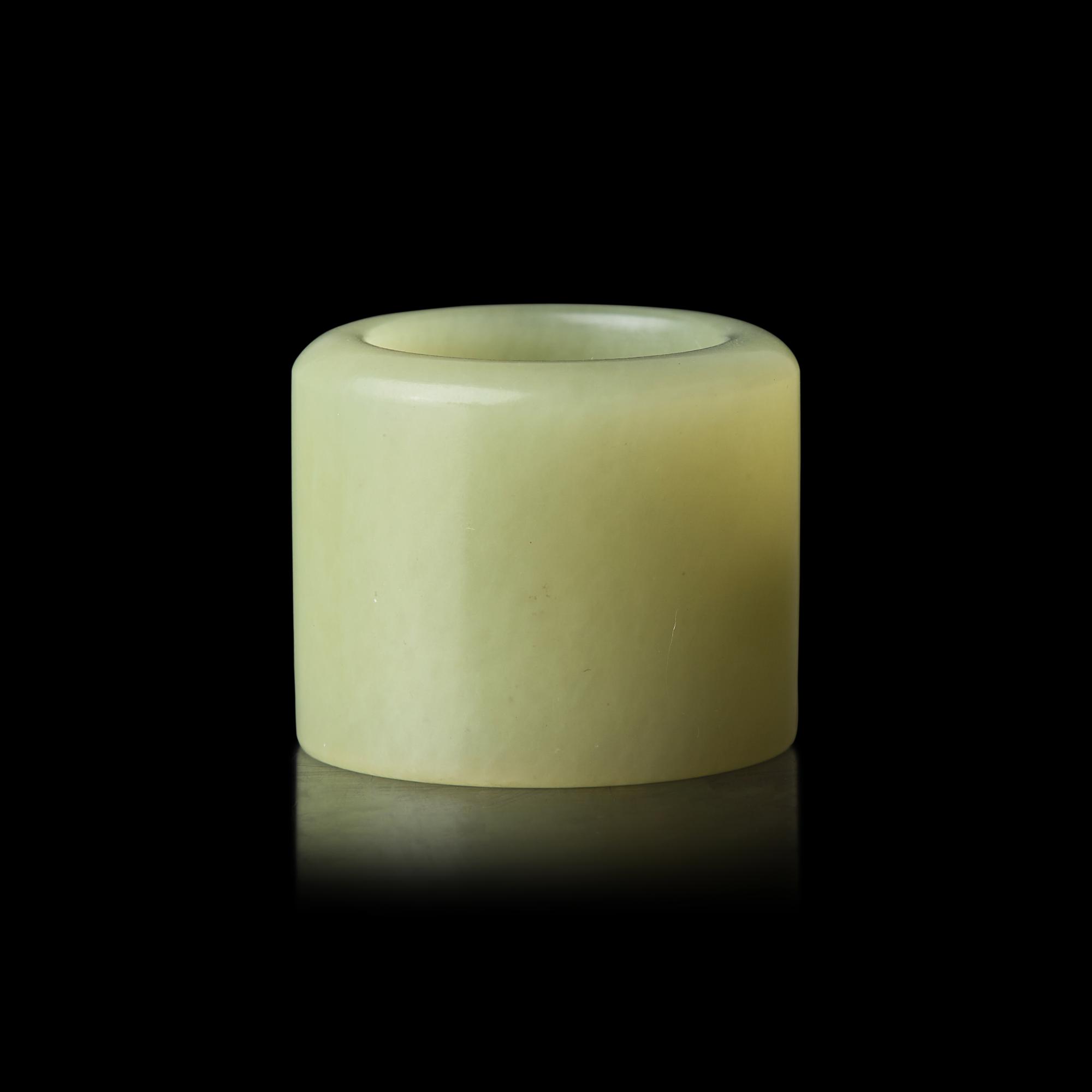 A Chinese Yellow Jade Archer's Ring, 18th/19th Century 清中期 黃玉素面扳指