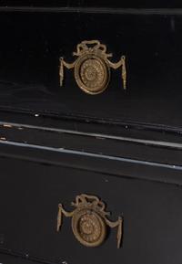 An Italian Gilt Metal Mounted Ebonized Chest of Drawers
