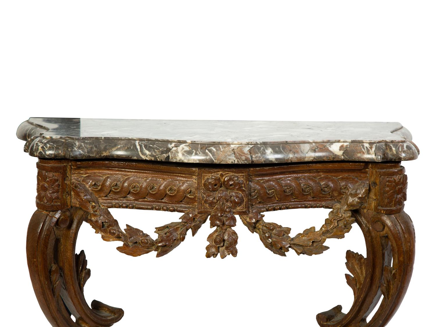 A Louis XV Giltwood and Marble Top Wall Mounted Console — THIRD QUARTER 18TH CENTURY