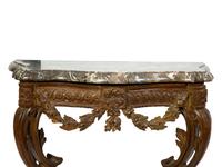 A Louis XV Giltwood and Marble Top Wall Mounted Console — THIRD QUARTER 18TH CENTURY