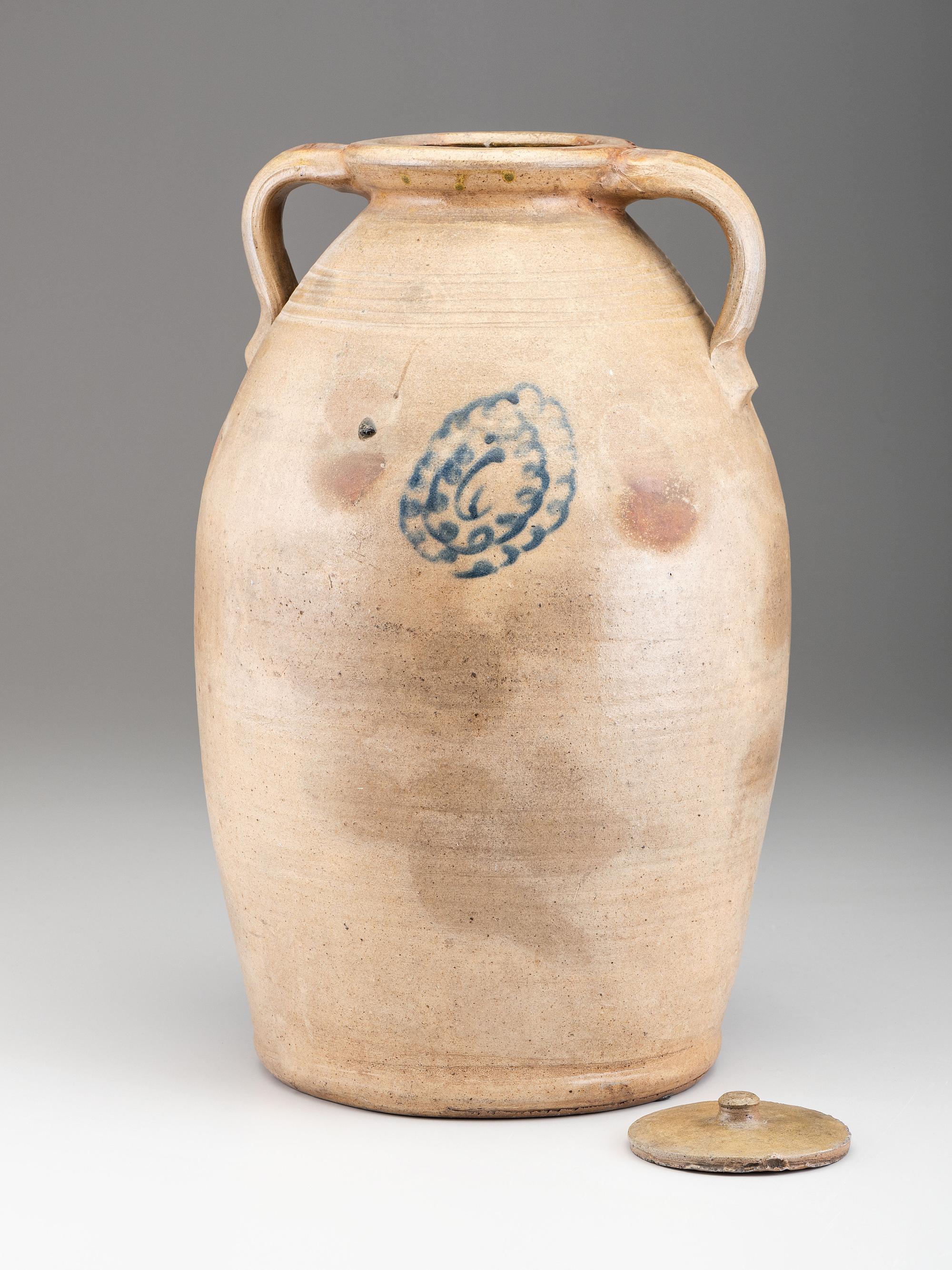 A Cobalt Script Decorated Six-Gallon Stoneware Jar