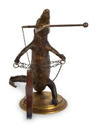 A Taxidermy Cayman Crocodile with Gong — 20TH CENTURY