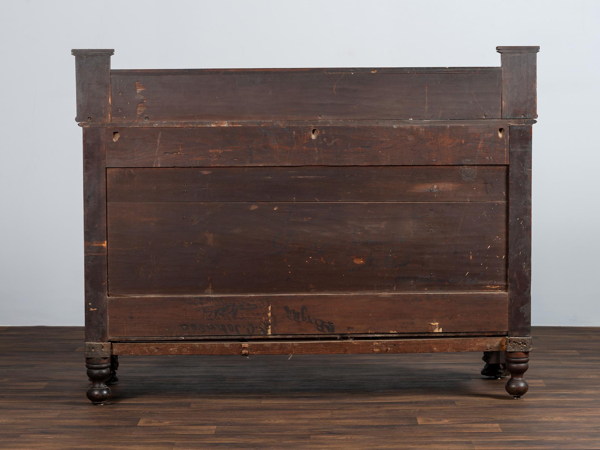 AWAITING DONATION - A Classical Carved and Stained Cherrywood Sideboard