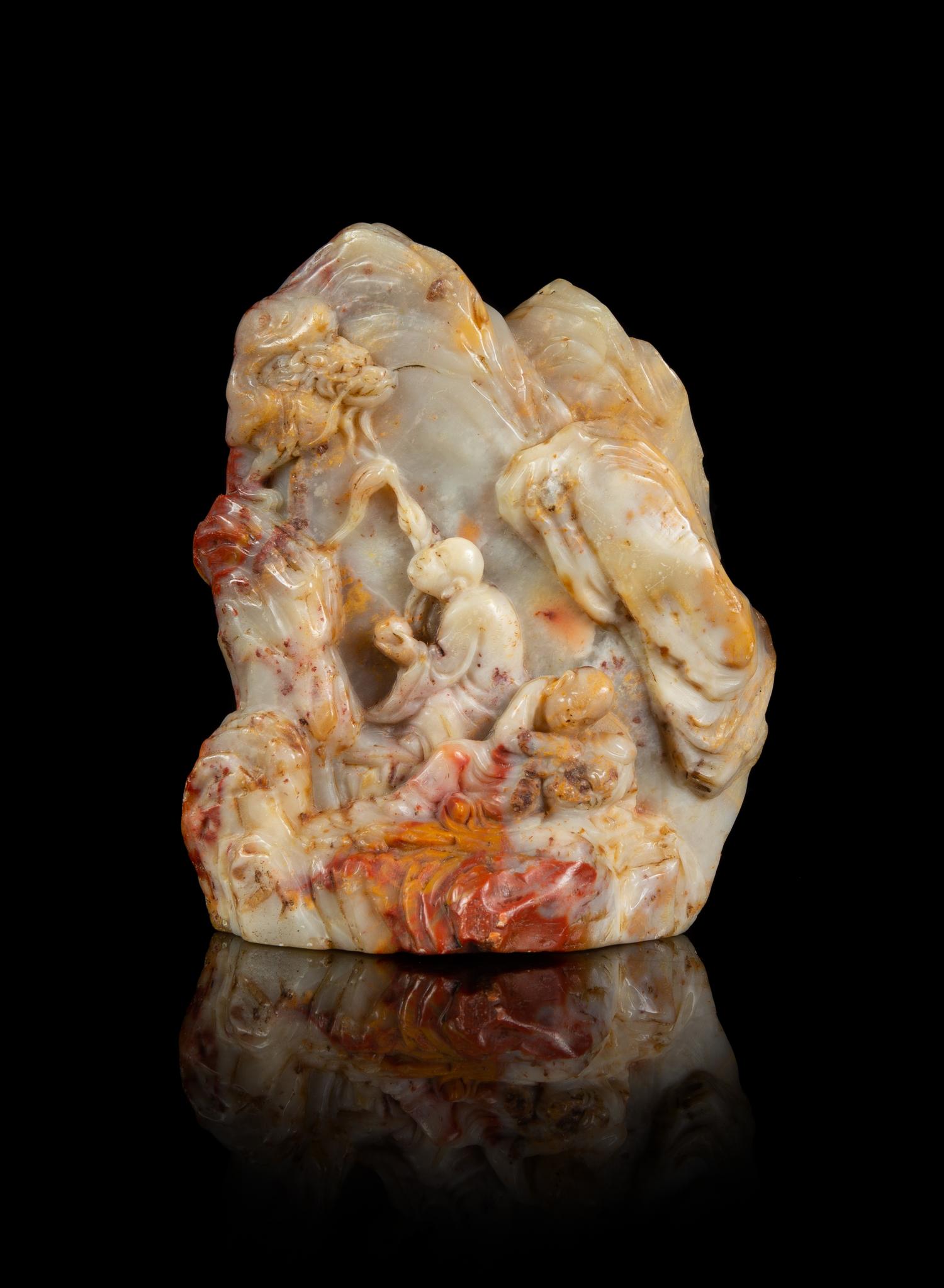 A Carved Chinese Soapstone Boulder