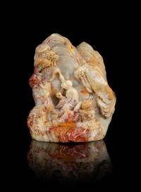 A Carved Chinese Soapstone Boulder