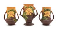 Three Roseville Waterlilly Pottery Vases Height of first 9 1/4 inches, pair 8 inches.