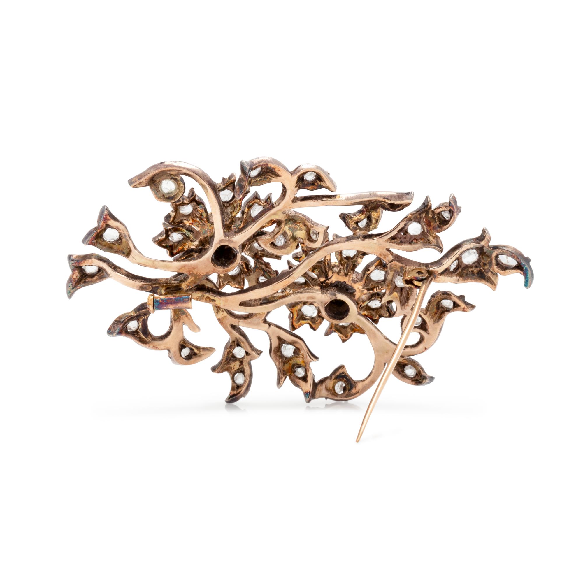 EMERALD AND DIAMOND FLOWER BROOCH