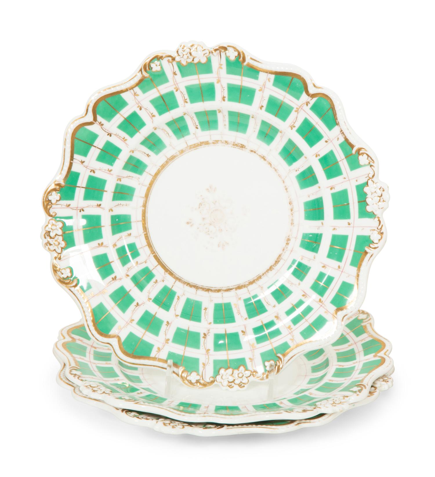Four Sets of English Porcelain Dessert Plates and a Set of Twelve Soft-Paste Dinner Plates