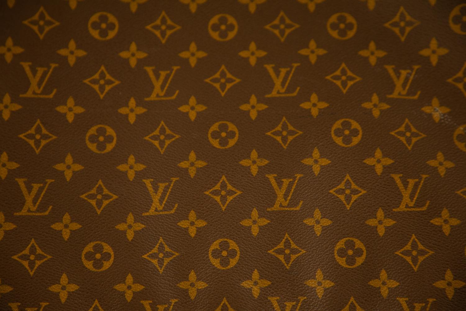 Five Louis Vuitton Luggage Pieces