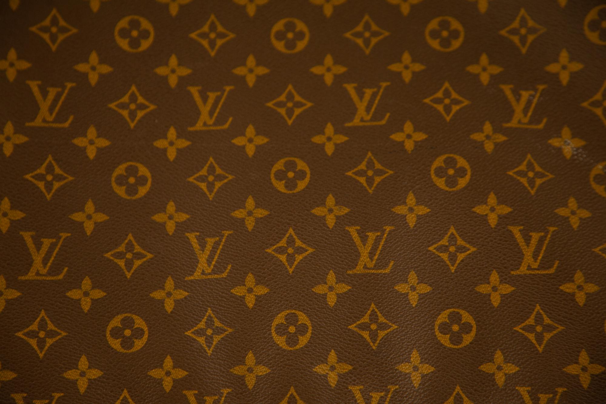 Five Louis Vuitton Luggage Pieces