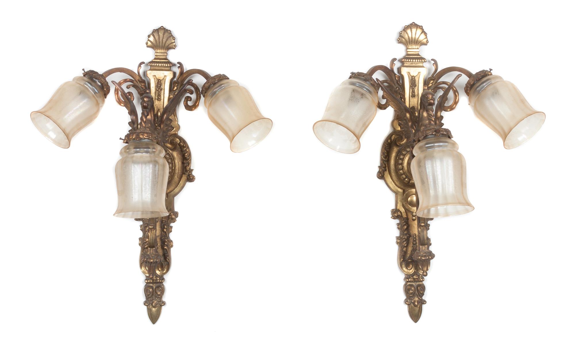 A Pair of Neoclassical Gilt Brass Three-Light Sconces Height 24 1/4 inches.