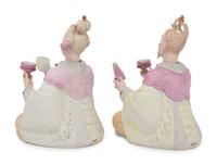 A Pair of German Porcelain “Nodder” Figures